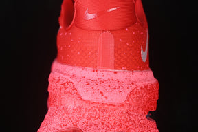 Nike Vomero “University Red Hyper Pink"