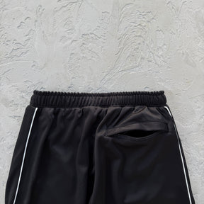 Conjunto Corteiz “Crest Arch Track Set”