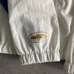 “Conjunto Corteiz” Olympic Shuku ( Branco com azul )