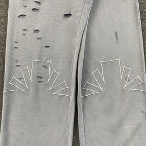 Calça Vertabrae “Ripped Geometric Embroidery”