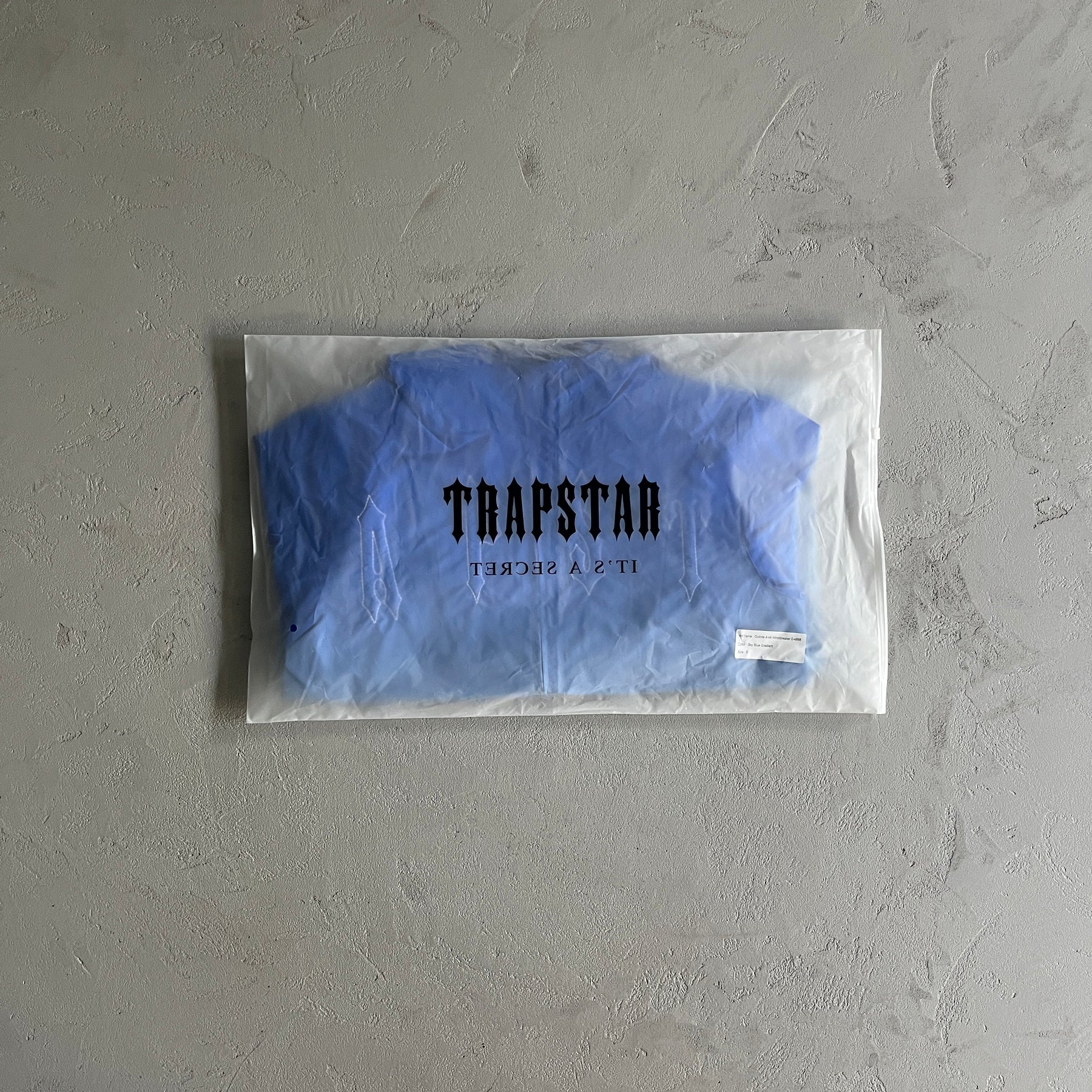 Corta Vento Trapstar “Outline Arch” ( Sky Blue )