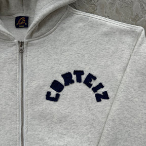 Conjunto Corteiz “College Arch Open”