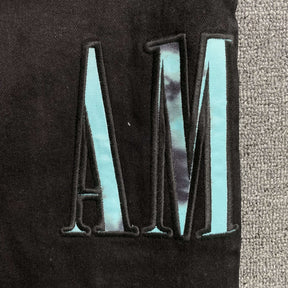 Calça Amiri “Camo”