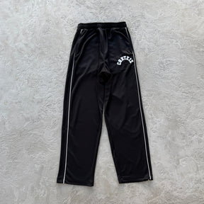 Conjunto Corteiz “Crest Arch Track Set”