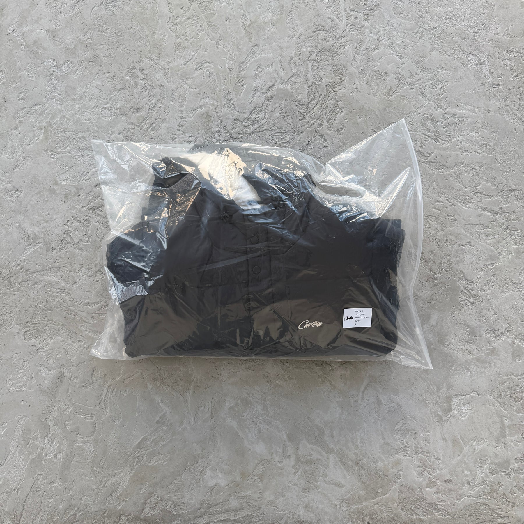 Casaco Corteiz “Bolo V2 Down” ( Preto Com Branco )