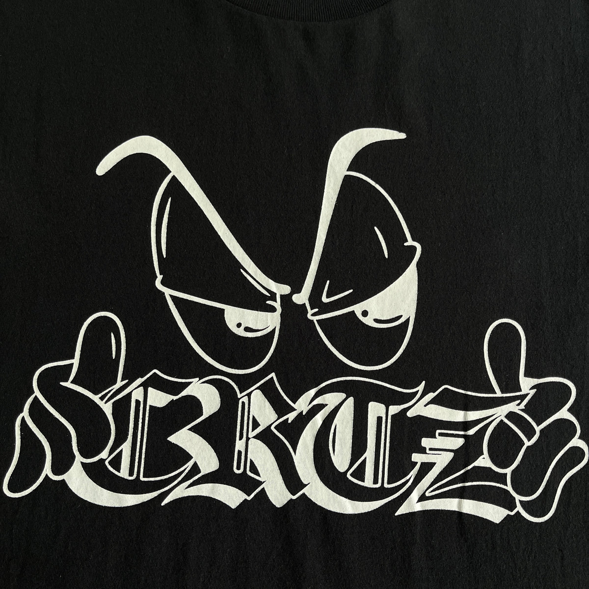 Camisa Corteiz “Cartoon Eyes” ( Preta )