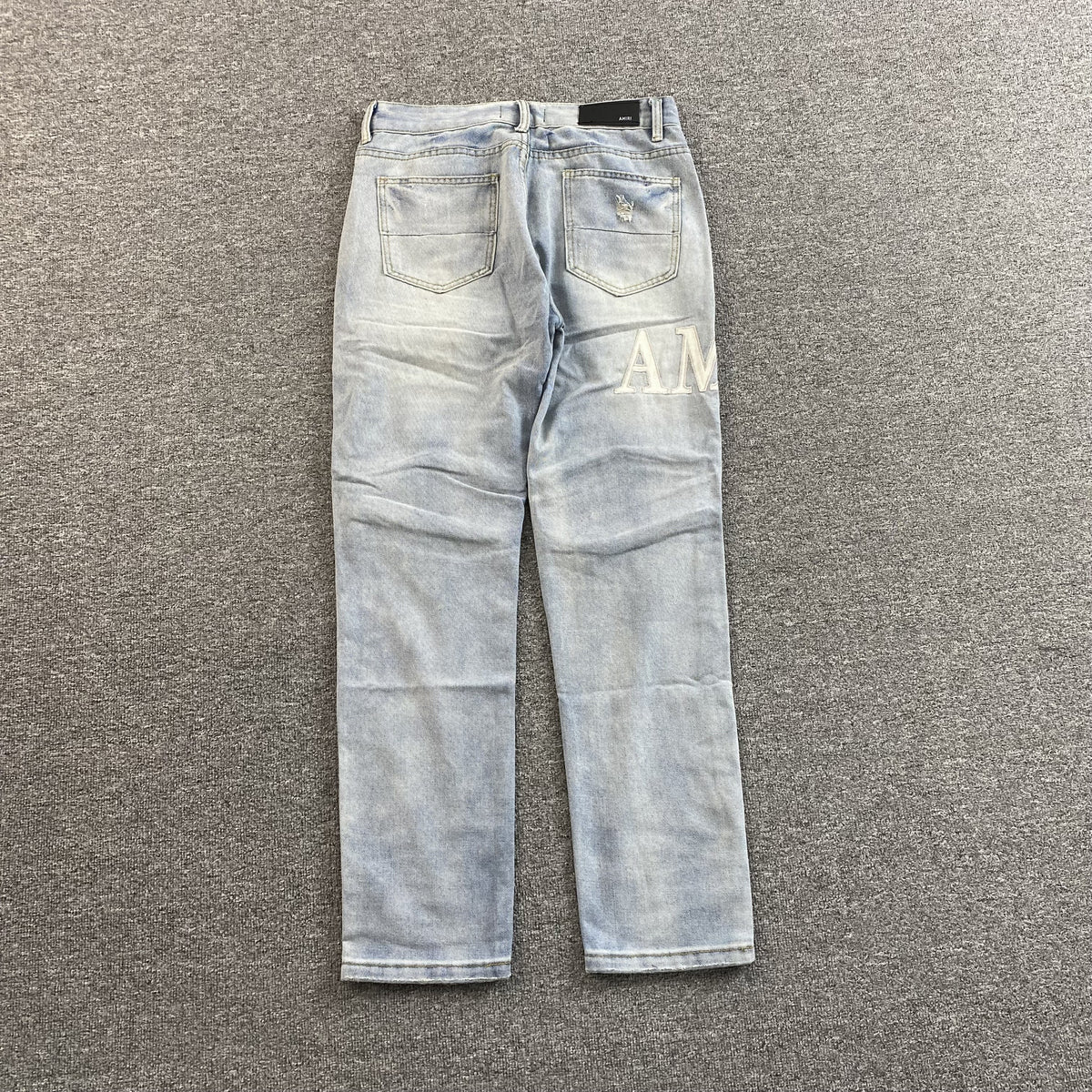 Calça Amiri “Logo Repair”