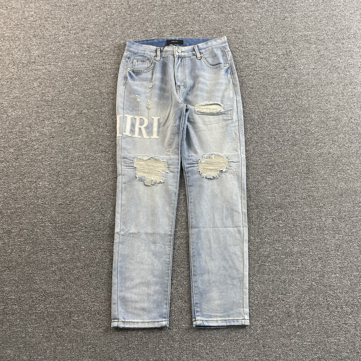 Calça Amiri “Logo Repair”