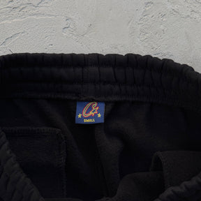 Conjunto Corteiz “Lion Varsity Open Hem Zip”