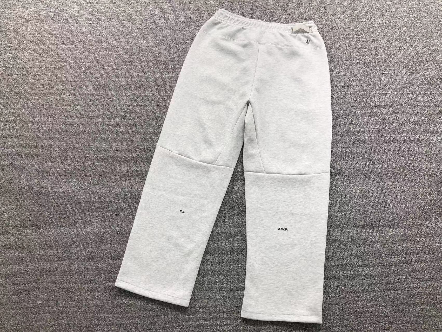 Conjunto Nocta x Nike Tech Fleece “Grey”