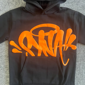 Conjunto Syna World “Syna Team“ ( Preto e Laranja )