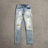 Calça Amiri “Ripped Yellow”