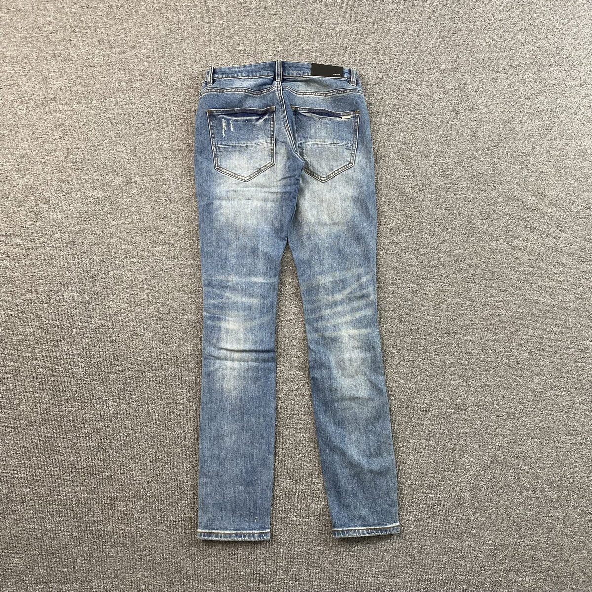 Calça Amiri “Plaid Thrasher”