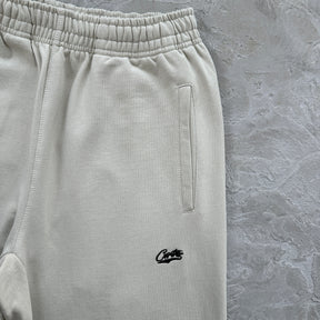 Conjunto Corteiz “Woosh Open Hem Sweatp”