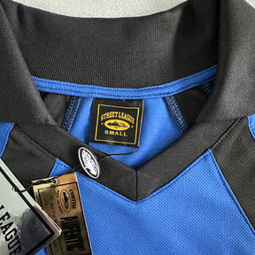 Camisa Corteiz ”Panel” ( Preta Com azul )