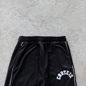 Conjunto Corteiz “Crest Arch Track Set”
