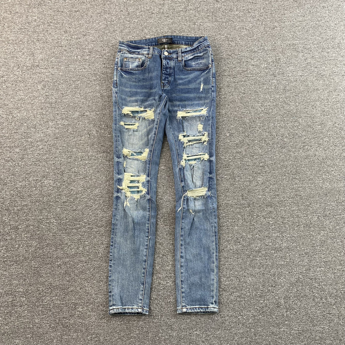 Calça Amiri “Plaid Thrasher”
