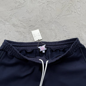 Conjunto Mertra “Glide Overlock Trackie”