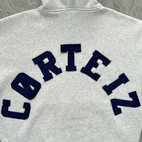 Conjunto Corteiz “College Arch Open”