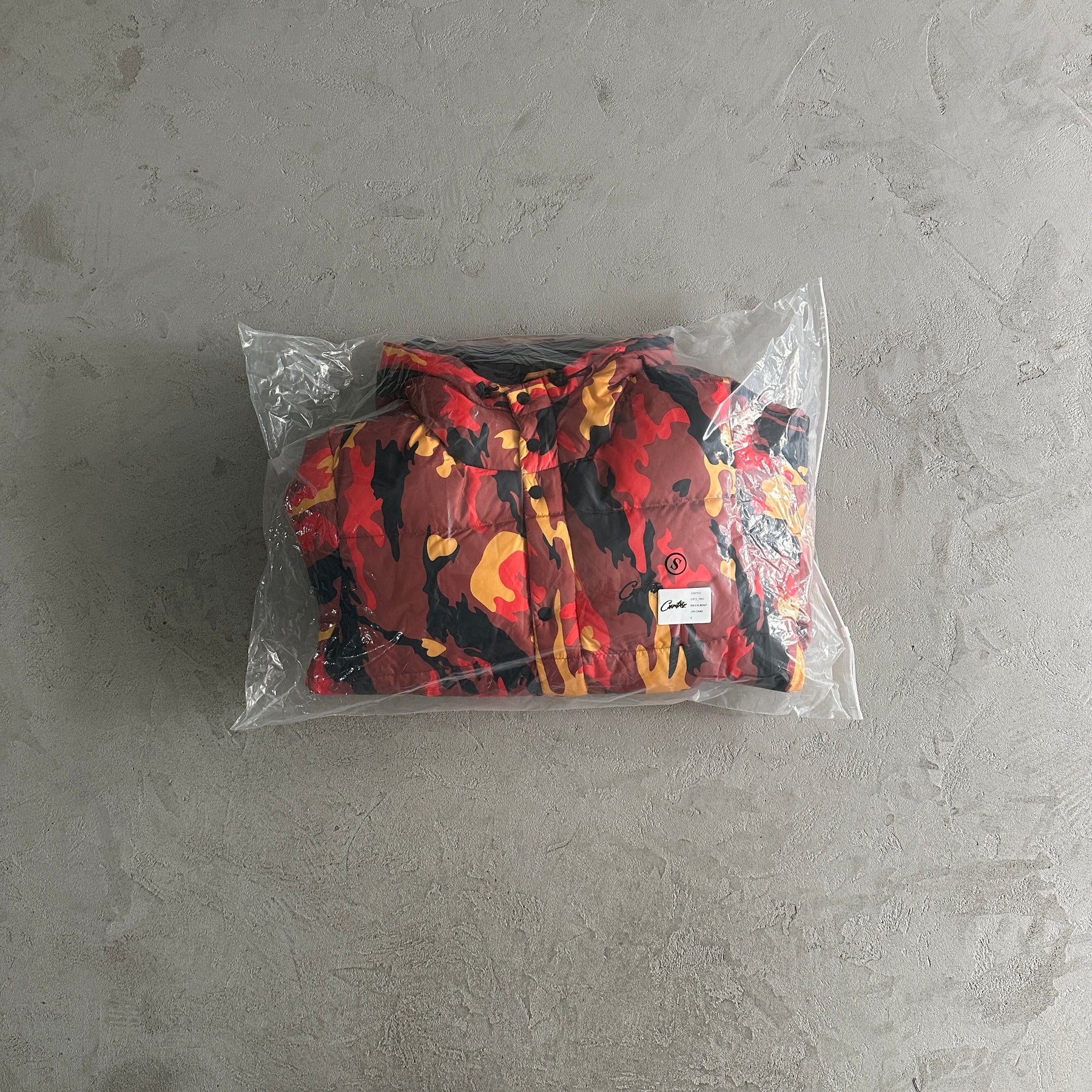 Jaqueta Corteiz “Bolo V2 Down”