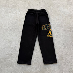 Conjunto Corteiz “Lion Varsity Open Hem Zip”
