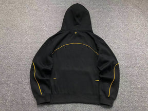 Conjunto Nocta x Nike “University Gold”