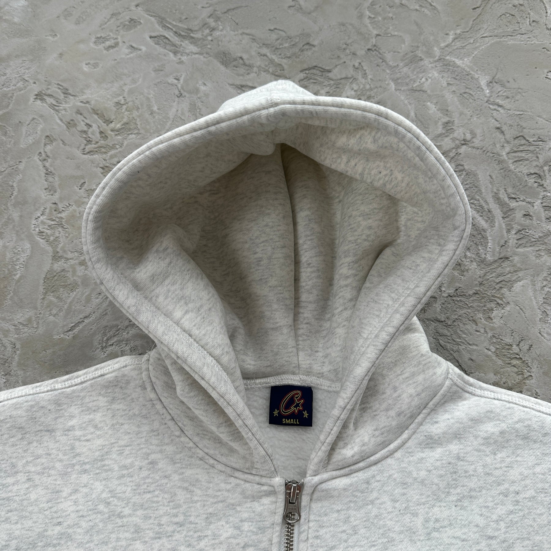 Conjunto Corteiz “College Arch Open”