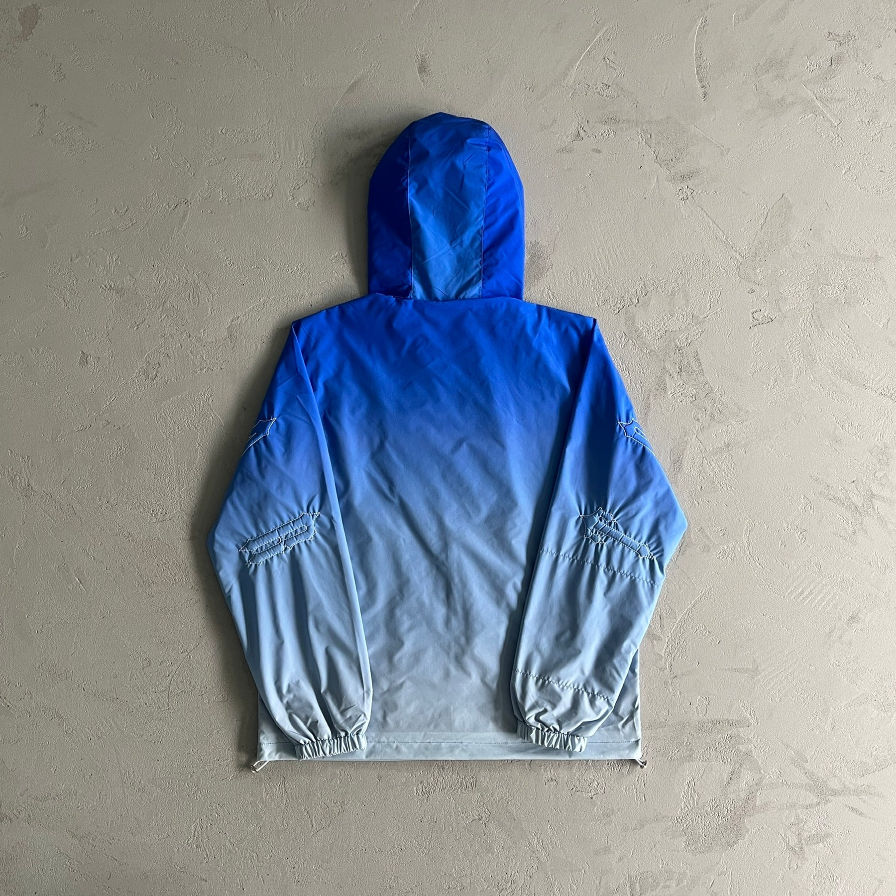 Corta Vento Trapstar “Outline Arch” ( Sky Blue )