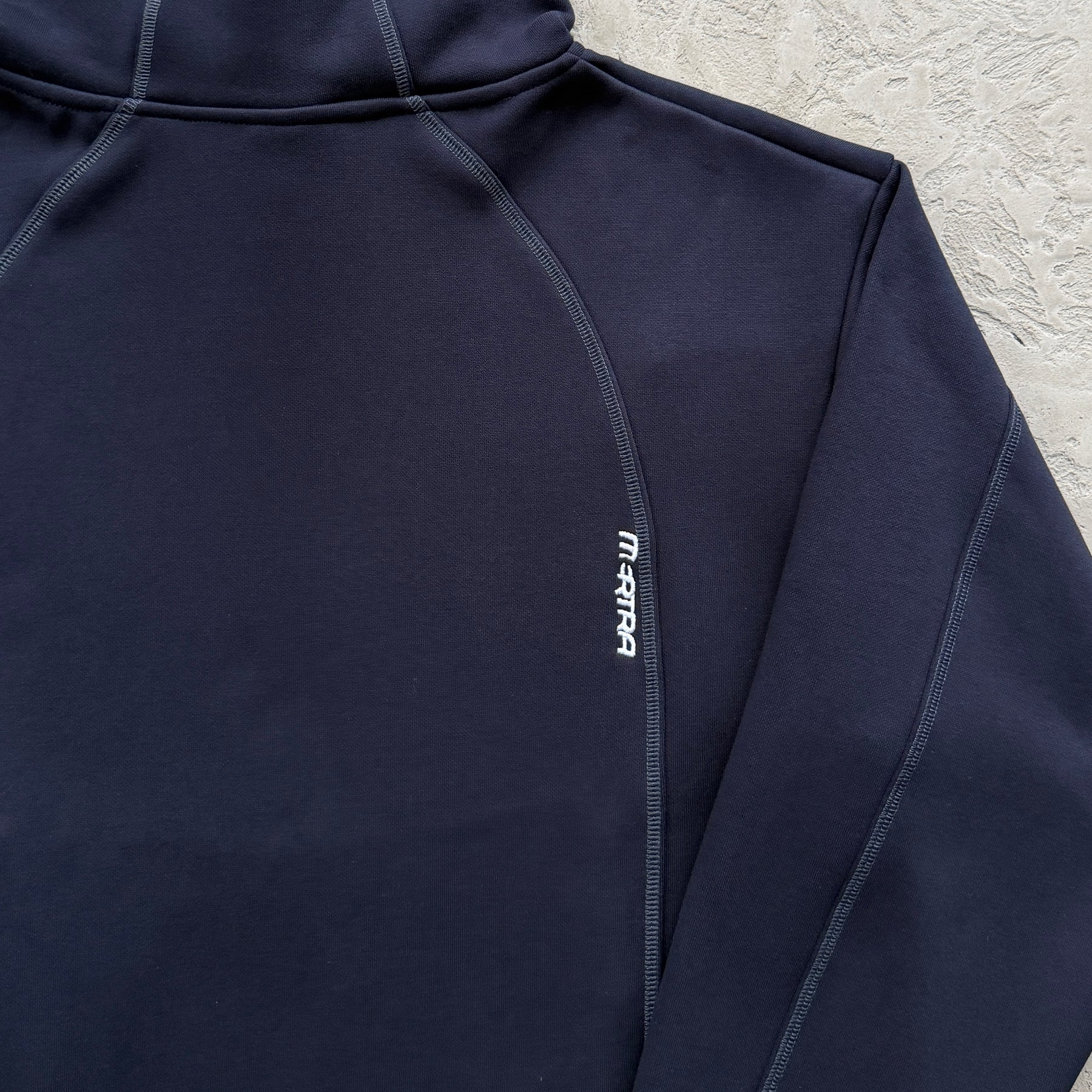 Conjunto Mertra “Glide Overlock Trackie”