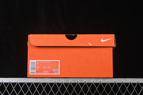 Nike Vomero “University Red Hyper Pink"
