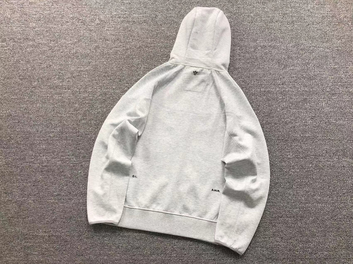 Conjunto Nocta x Nike Tech Fleece “Grey”