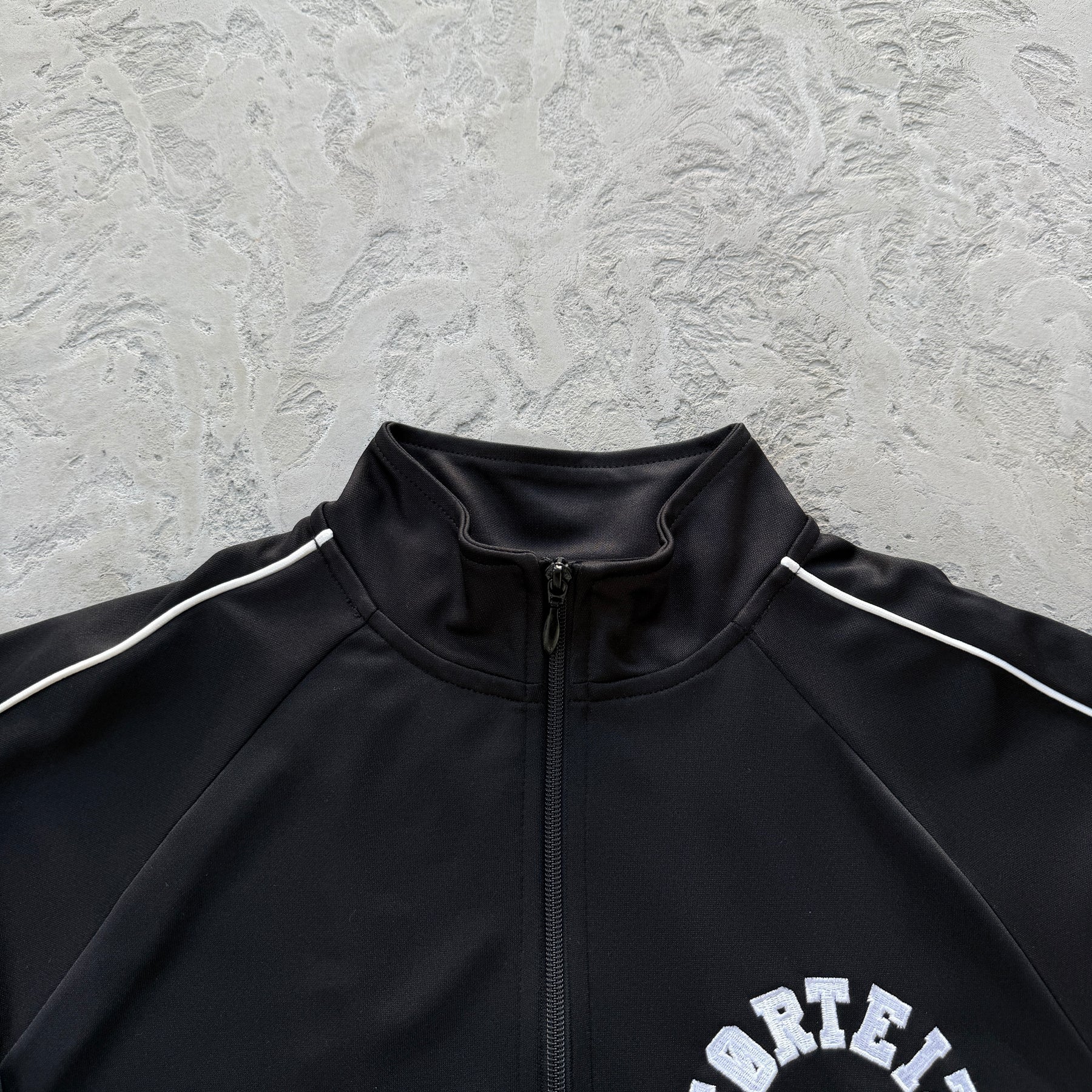 Conjunto Corteiz “Crest Arch Track Set”