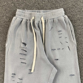 Calça Vertabrae “Ripped Geometric Embroidery”