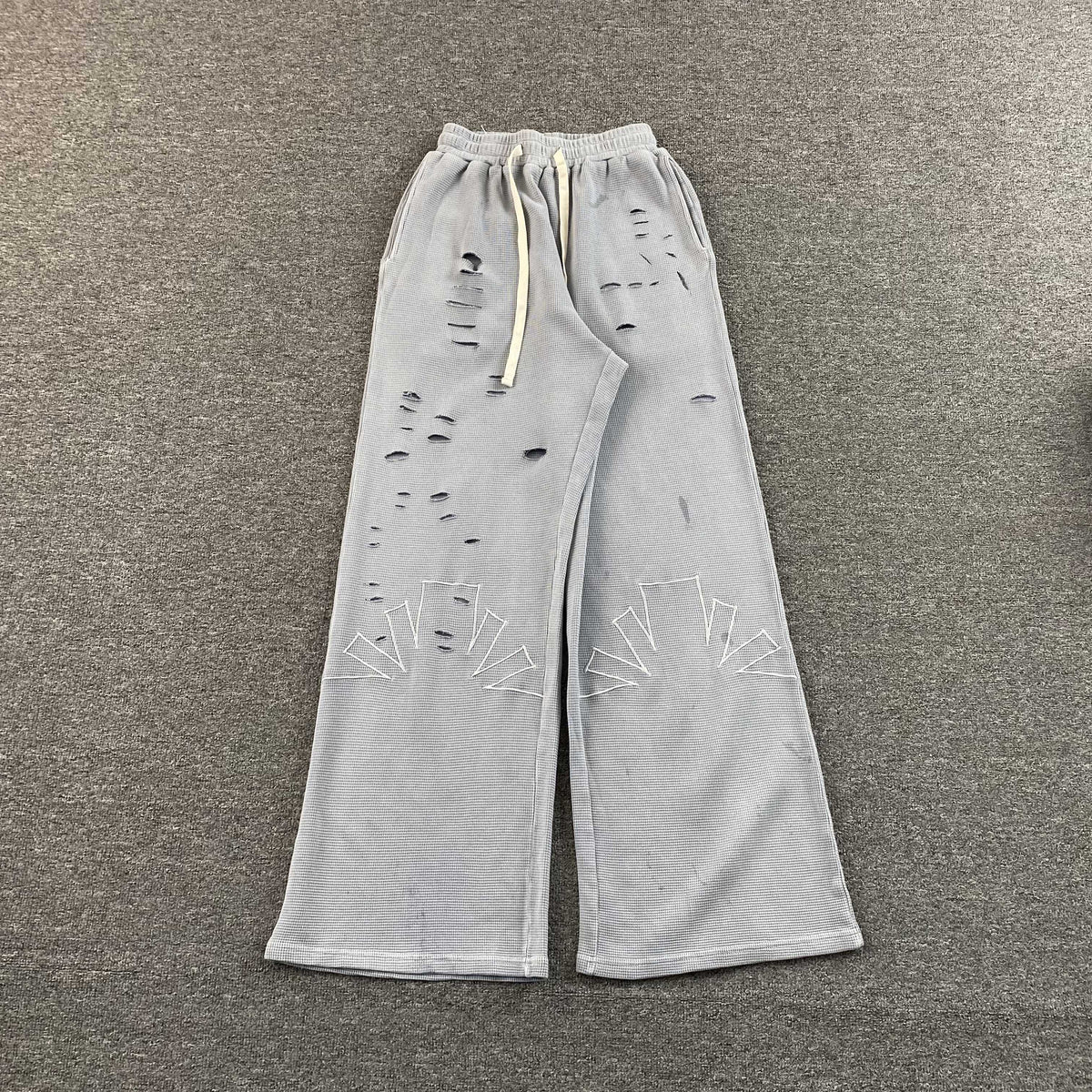 Calça Vertabrae “Ripped Geometric Embroidery”