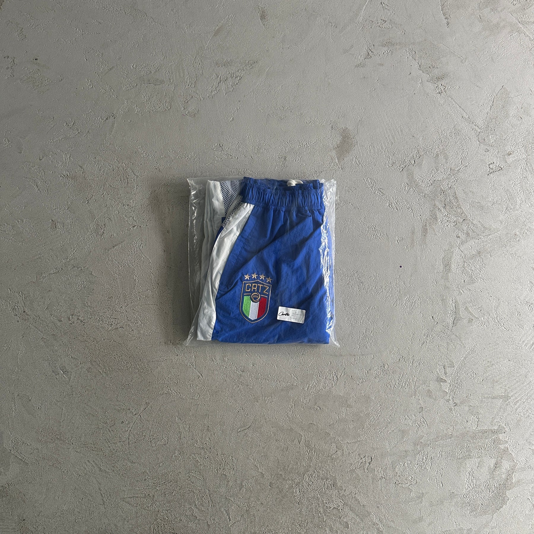 “Conjunto Corteiz” Olympic Shuku ( Branco com azul )