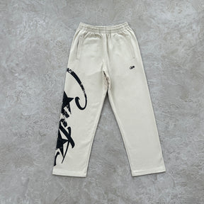 Conjunto Corteiz “Woosh Open Hem Sweatp”