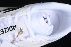 Adizero “Evo SL” ( White and Black )