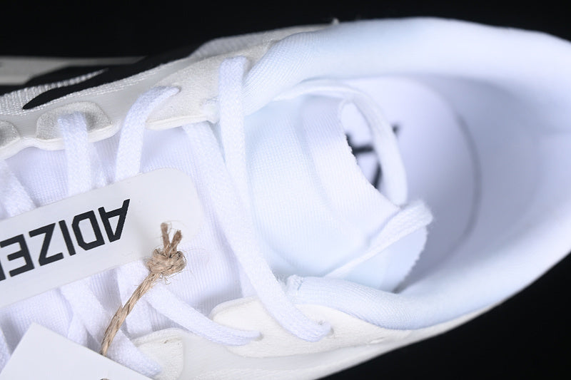 Adizero “Evo SL” ( White and Black )