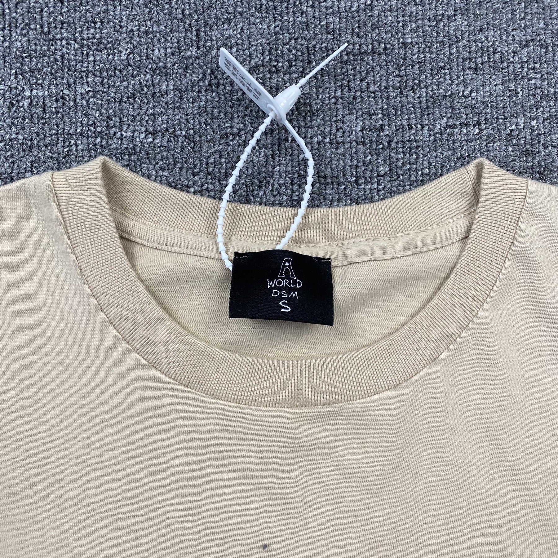 Camisa Cactus Jack “Lets Get Weird” ( Bege )