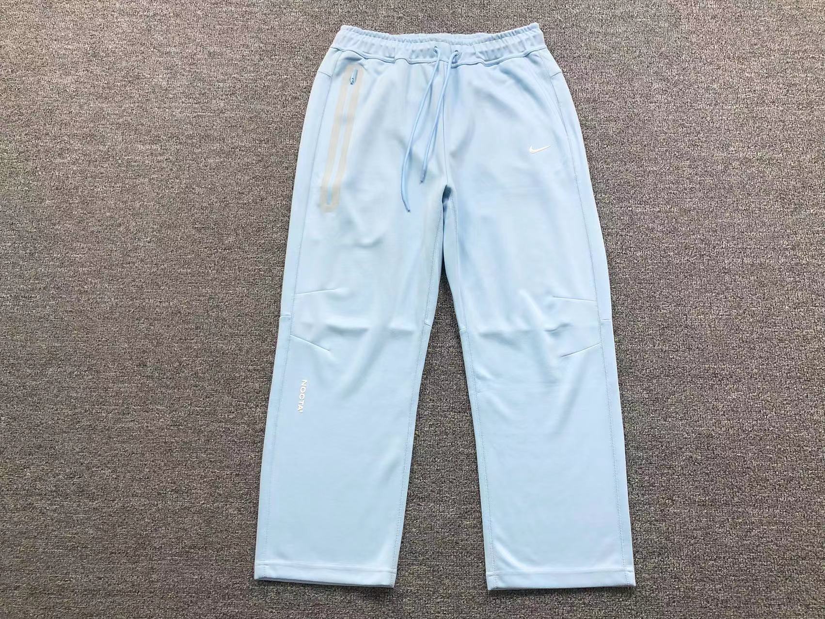 Conjunto Nocta x Nike Tech Fleece “University Blue”