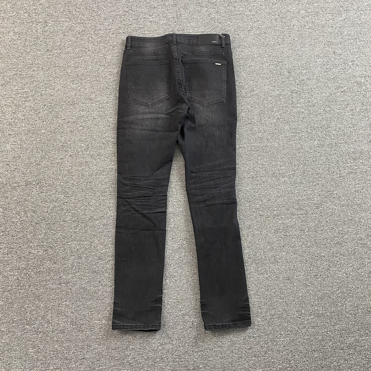 Calça Amiri “MX1 Cracked Paint”