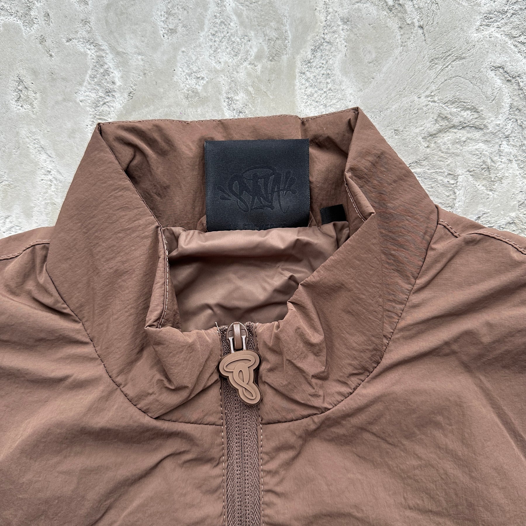 Conjunto Syna World “Team Pipe” ( Marrom )