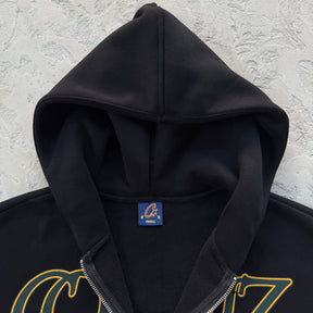 Conjunto Corteiz “Lion Varsity Open Hem Zip”