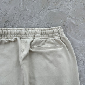 Conjunto Corteiz “Woosh Open Hem Sweatp”