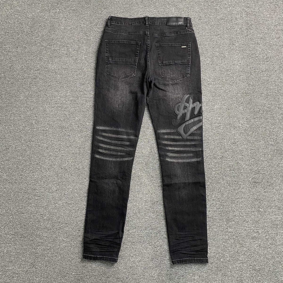 Calça Amiri “Aged Broken”